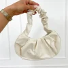 Ariel tas creme