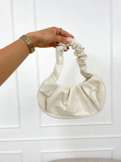 Ariel tas creme